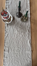 Gray Linen table runner with candles and candies